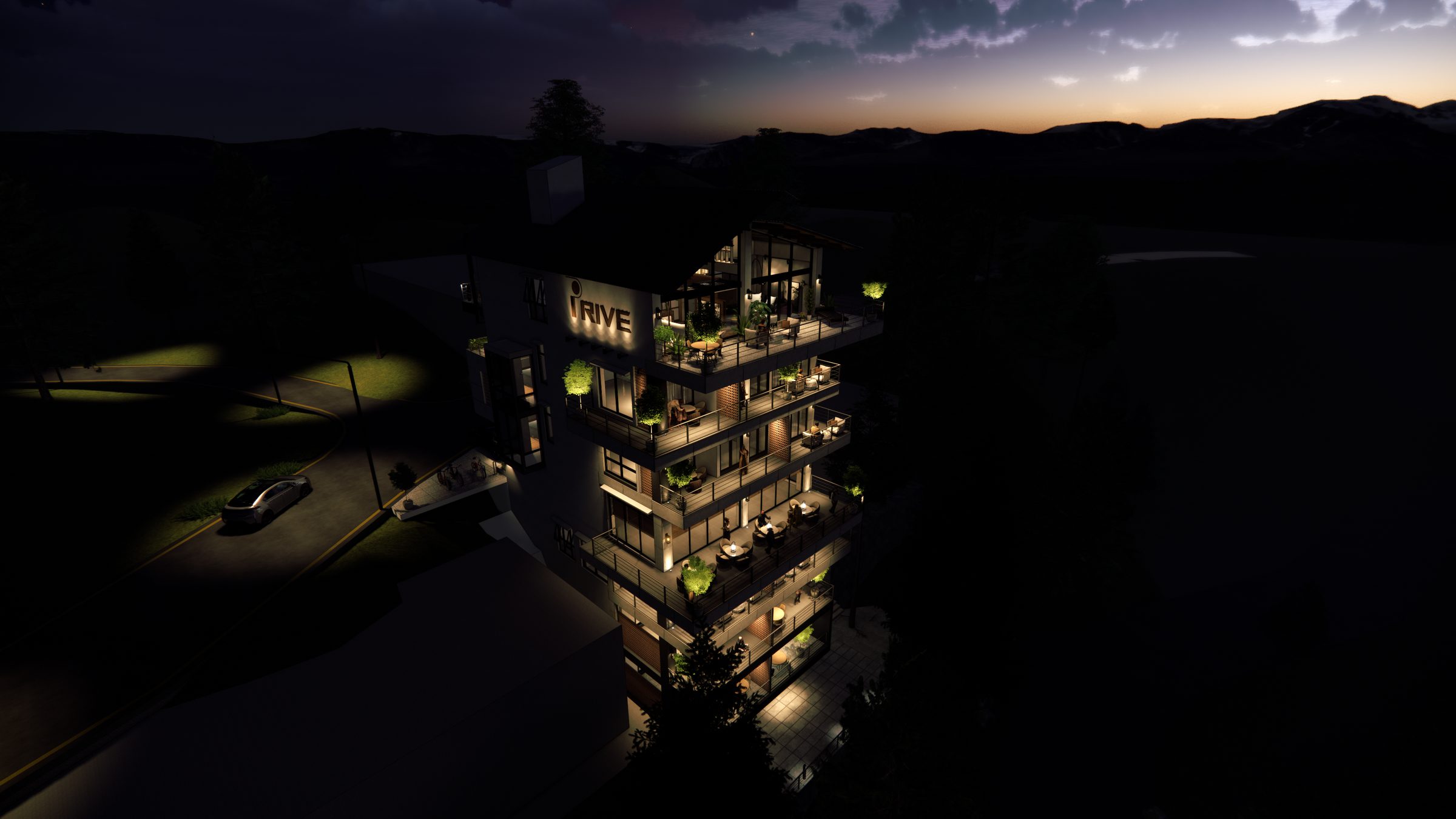 Privé seen from above at dusk, the valley falling away below