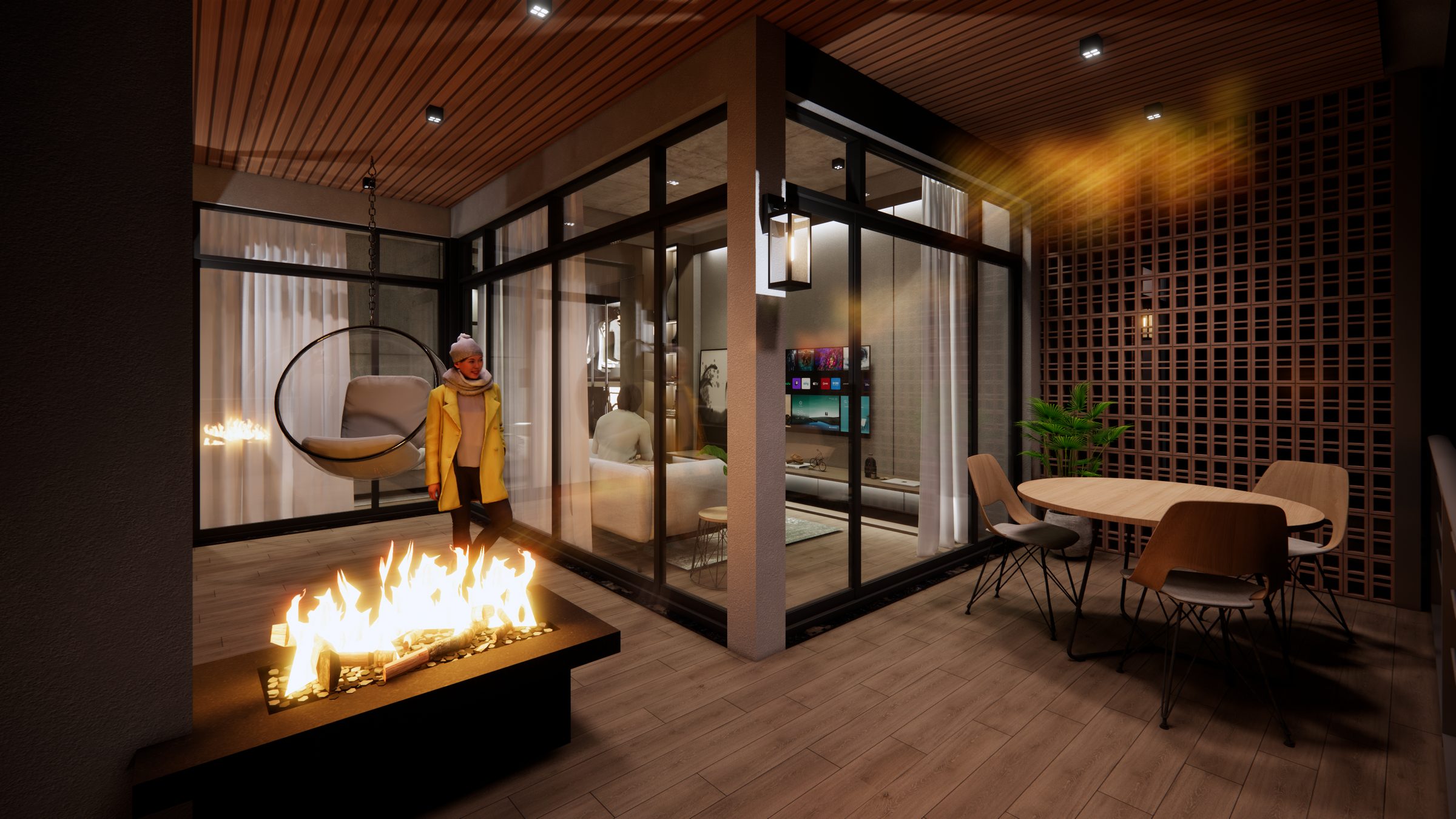 Terrace fire pit beside the glazed living room at night